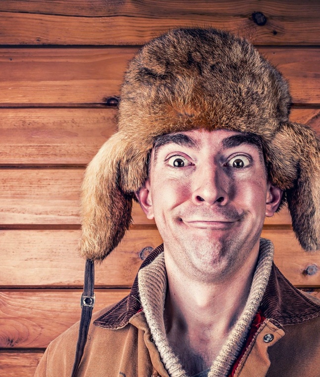 A man wearing a traditional Russian ushanka hat