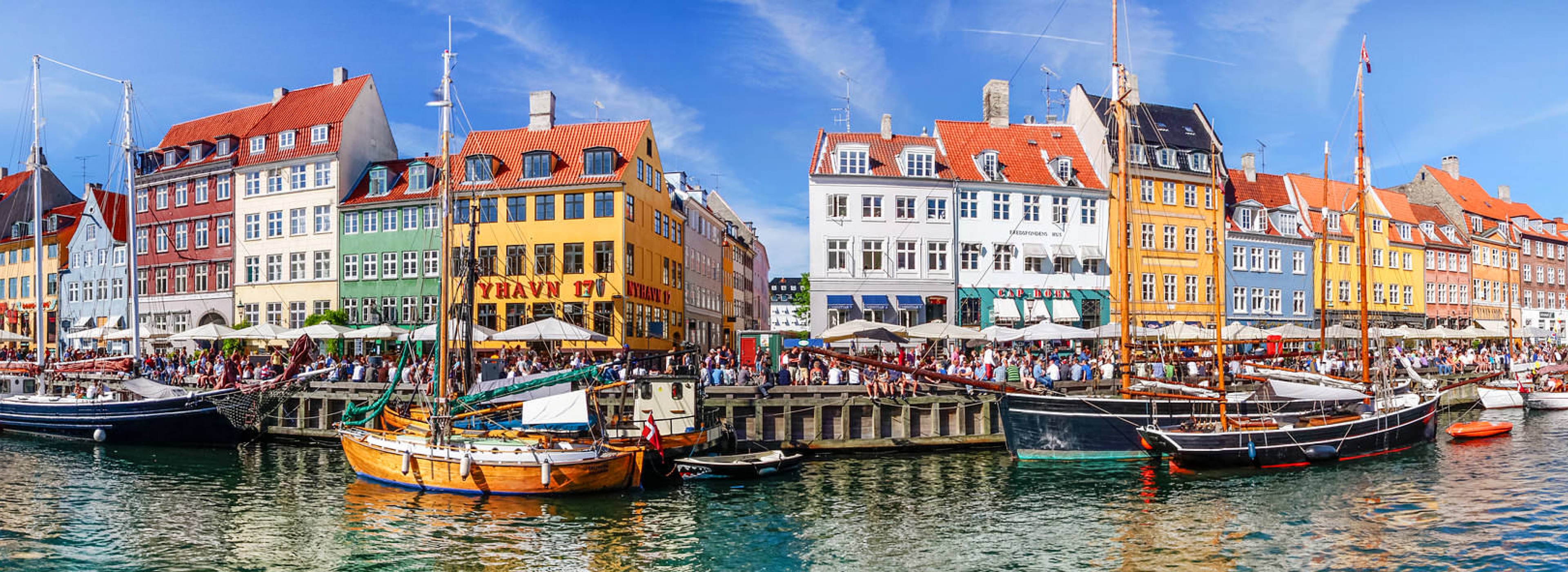 Nyhavn harbor is the most famous attraction in the capital of Denmark - Copenhagen